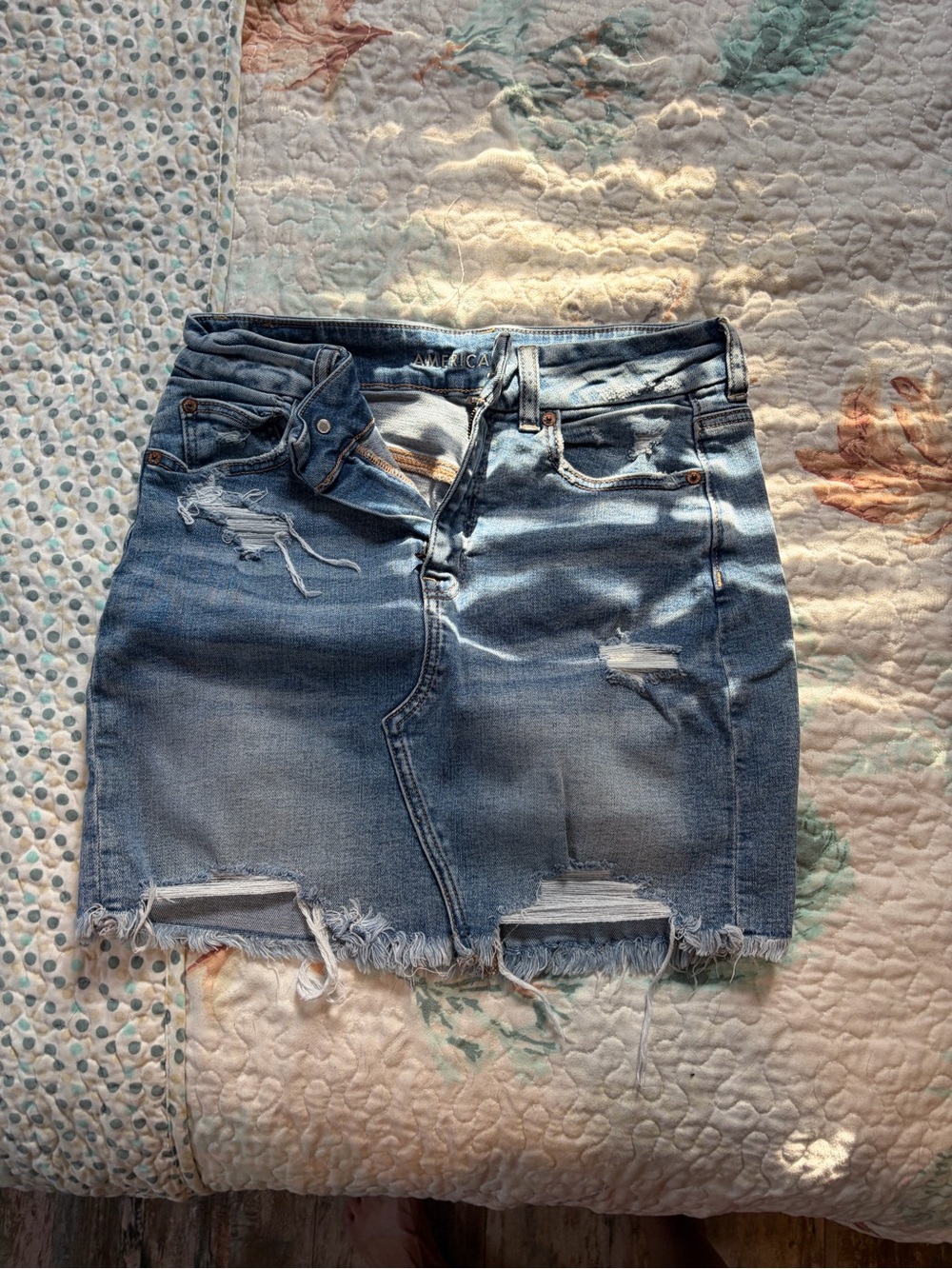 American Eagle Outfitters Light Blue Distressed Denim Mini Skirt